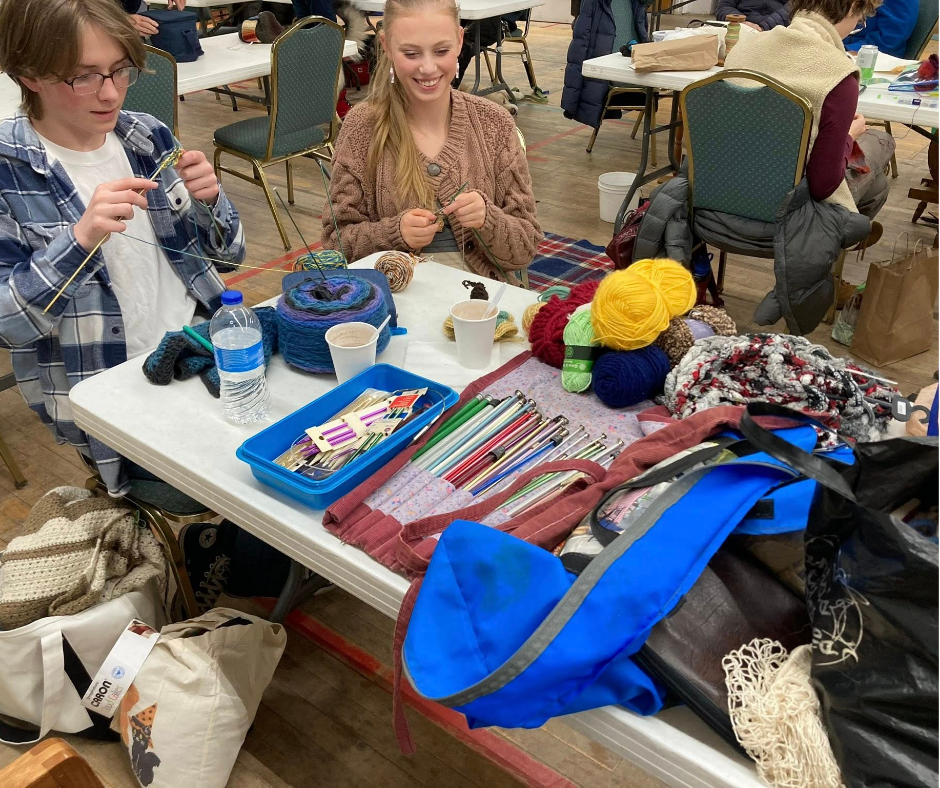 Young guild members knitting during Open Studio